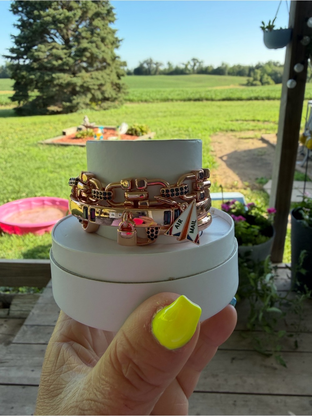 Gold-Tone Charm Link Bracelet with Pink Enamel Accents
